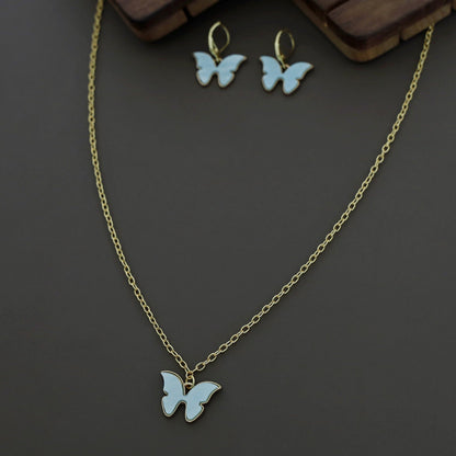 Butterfly neckpiece with hoop earrings
